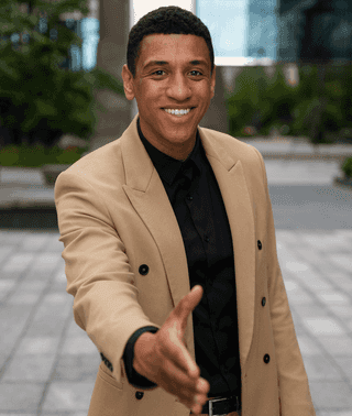 Black male on brown suit